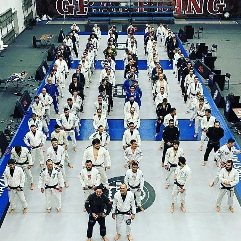 Adam Fox leading a large jiu jitsu seminar